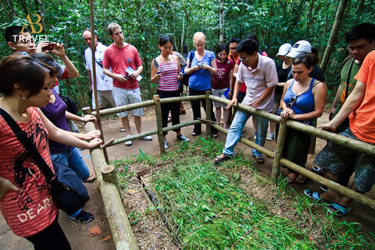 Visitors watching a traditional handicraft demonstration on the best Cu Chi tours.